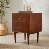 scandinavian walnut bedside table styled next to matching chest of drawers