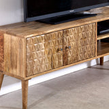 Closeup tv-cabinet-120cm-mango-wood-2-door-shelves Wooden TV stand with geometric patterned doors in a room setting.