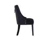 Windsor velvet dining chairs arranged around dining table